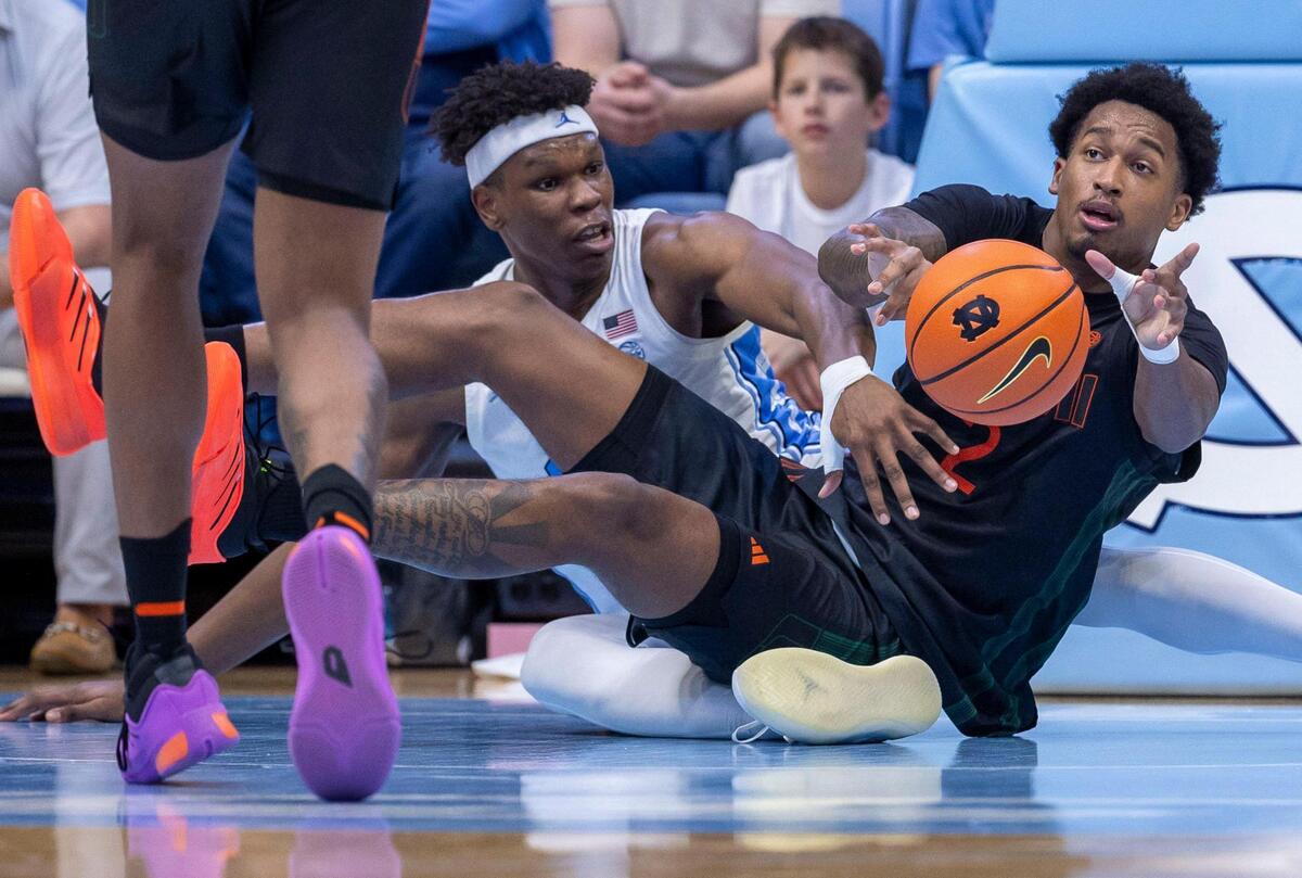 Miami forward Brandon Johnson (2) looks for an open teammate after securing a lose ball against North Carolina’s Ven-Allen Lubin (22) in the second half on Saturday, March 1, 2025 at the Smith Center in Chapel Hill, N.C.