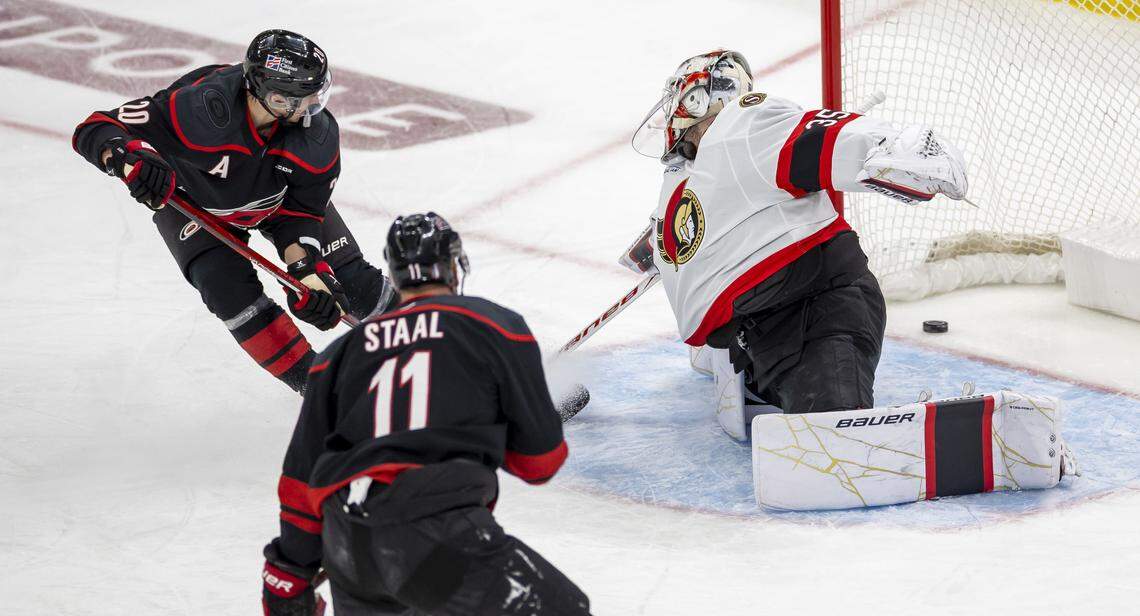 Carolina Hurricanes center Sebastian Aho (20) scores on Ottawa Senators goalie Liunus Ullmark (35) to take a 2-0 lead in the second period of Game 2 on Monday, April 20, 2026 during the first round of the Stanley Cup Playoffs at Lenovo Center in Raleigh, N.C.