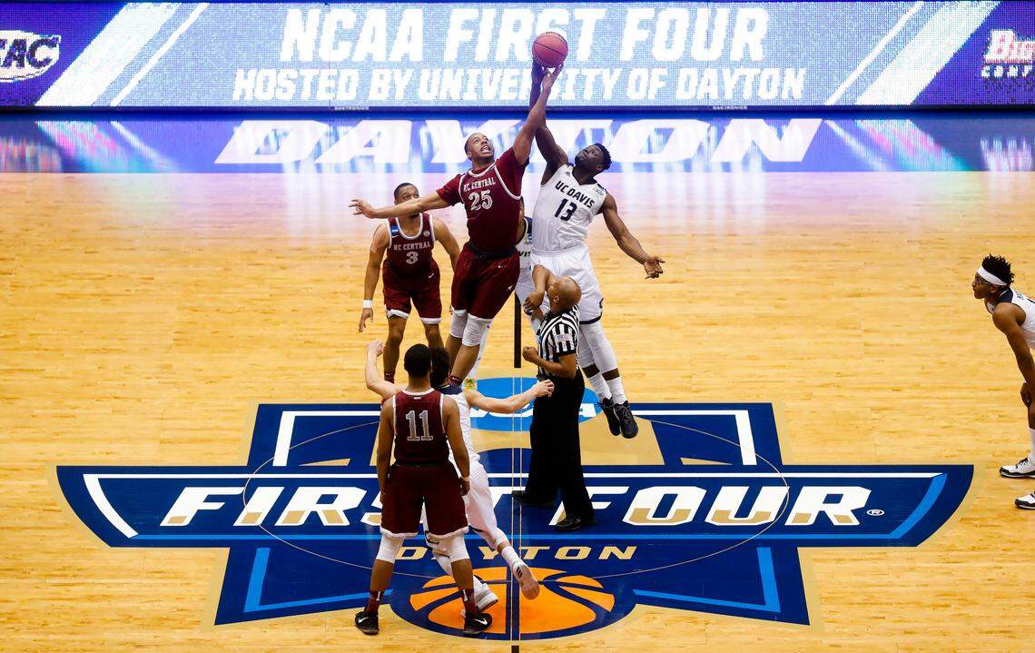 North Carolina Central’s Kyle Benton (25) and UC Davis’ J.T. Adenrele (13) vie for the tip off in the first half of a First Four game of the NCAA men’s college basketball tournament, Wednesday, March 15, 2017, in Dayton, Ohio.