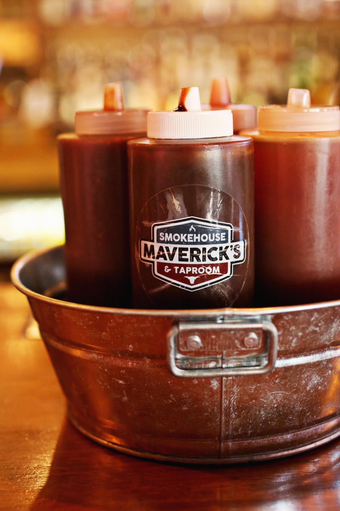 Maverick’s has several bottles of barbecue sauce on each table.