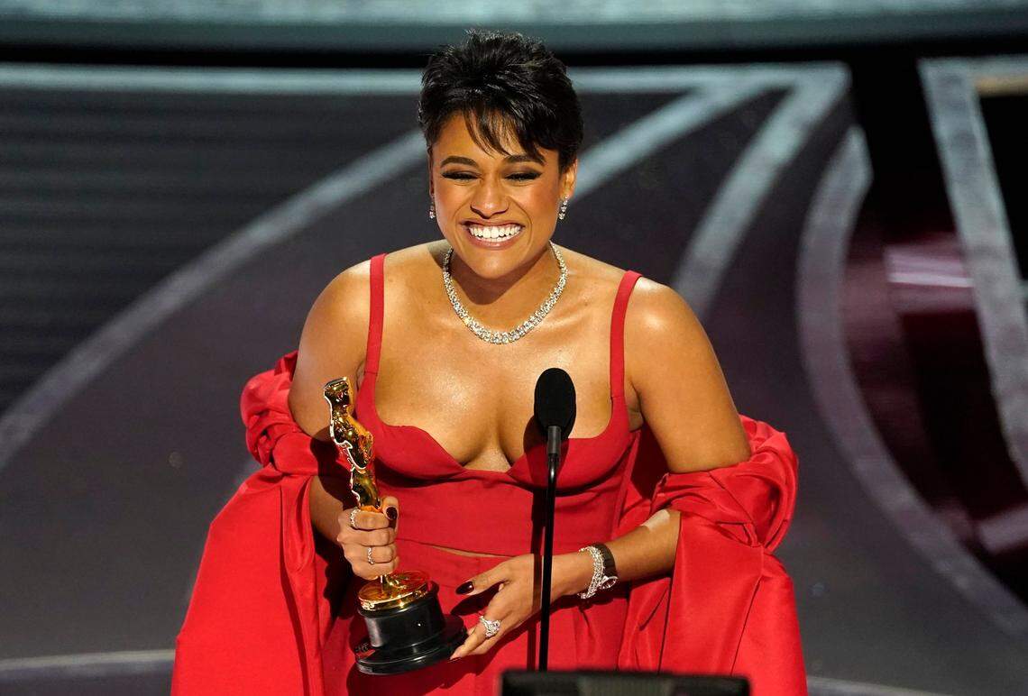 Ariana DeBose accepts the award for best performance by an actress in a supporting role for “West Side Story” at the Oscars on Sunday, March 27, 2022, at the Dolby Theatre in Los Angeles.