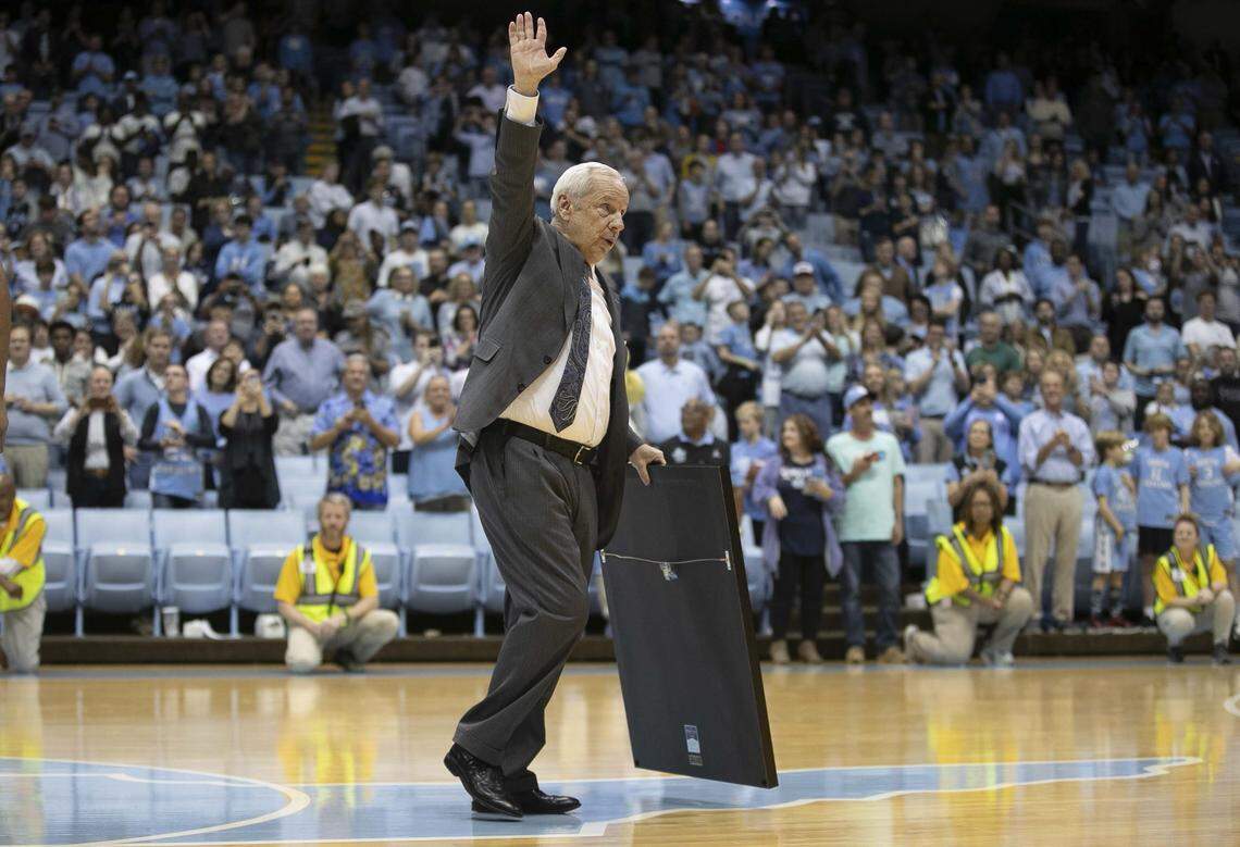Roy Williams leaves the court after he was honored for tying Dean Smith’s record of 879 career victories following the Tar Heel’s 70-67 victory over Yale on Monday, December 30, 2019 at the Smith Center in Chapel Hill, N.C.