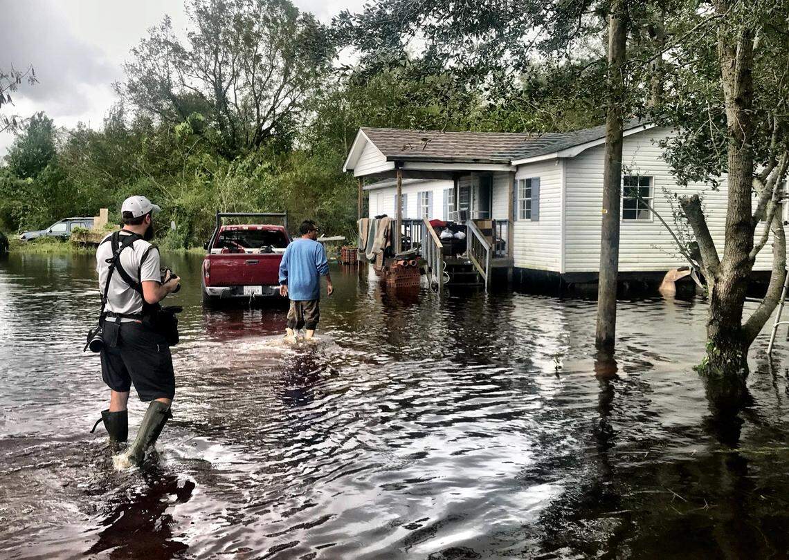 News & Observer veteran photojournalist Travis Long covers flooding from Hurricane Florence near Kinston in 2018.