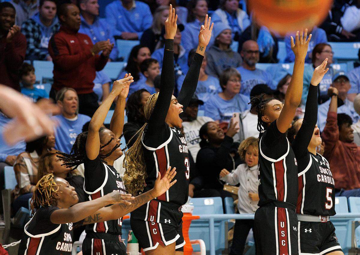 The South Carolina bench reacts following a made basket during the second half of the Gamecocks’ 65-58 win over North Carolina on Thursday, Nov. 30, 2023, at Carmichael Arena in Chapel Hill, N.C.