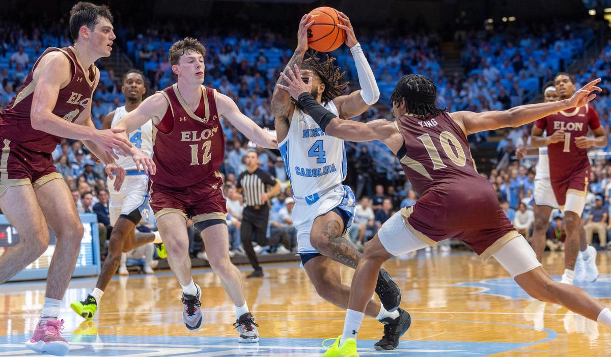North Carolina guard R.J. Davis (4) drives to the basket against Elon’s Andrew King (10) during the first half on Monday, November 4, 2024 at the Smith Center in Chapel Hill, N.C.