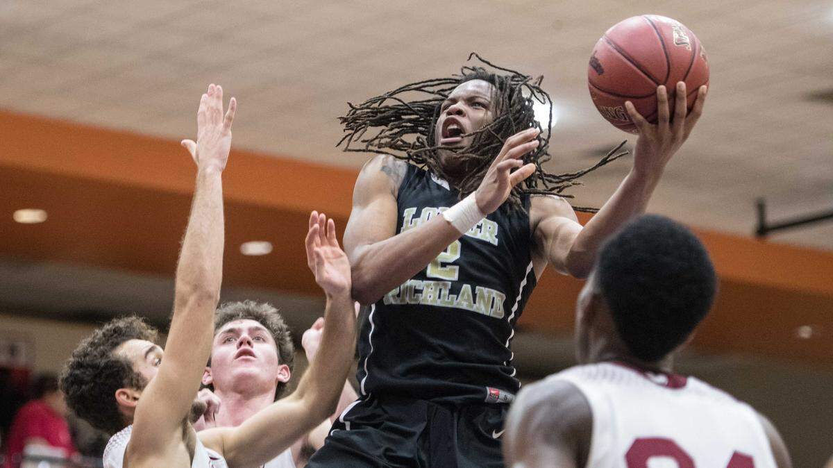 Lower Richland's Christian Brown attempts a shot against Porter Gaud on Dec 20, 2017, in Columbia, S.C. Brown released his top seven schools list on Instagram on Sunday.