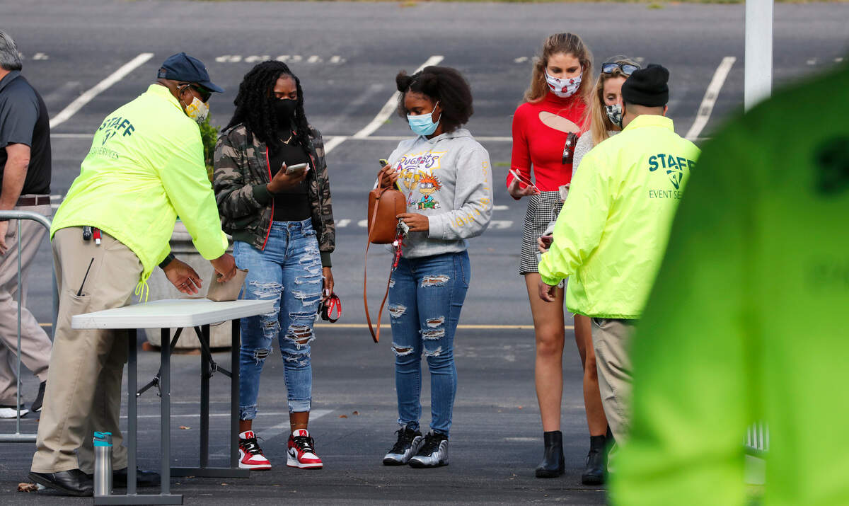 Fans enter Carter-Finley Stadium before N.C. State’s game against Duke Saturday, Oct. 17, 2020.