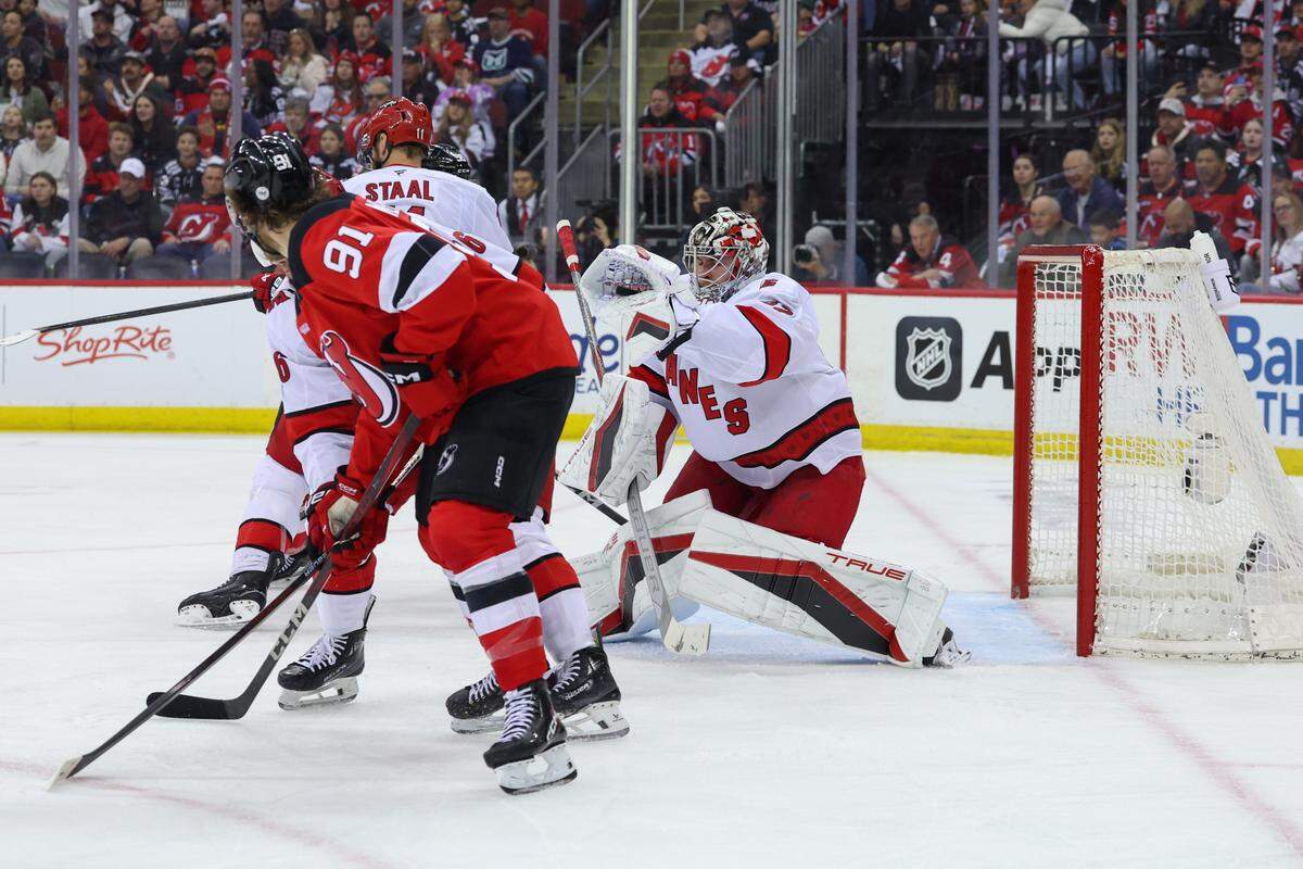 Carolina Hurricanes goaltender Pyotr Kochetkov (52) makes a save against the New Jersey Devils during the second period in game four of the first round of the 2025 Stanley Cup Playoffs at Prudential Center.