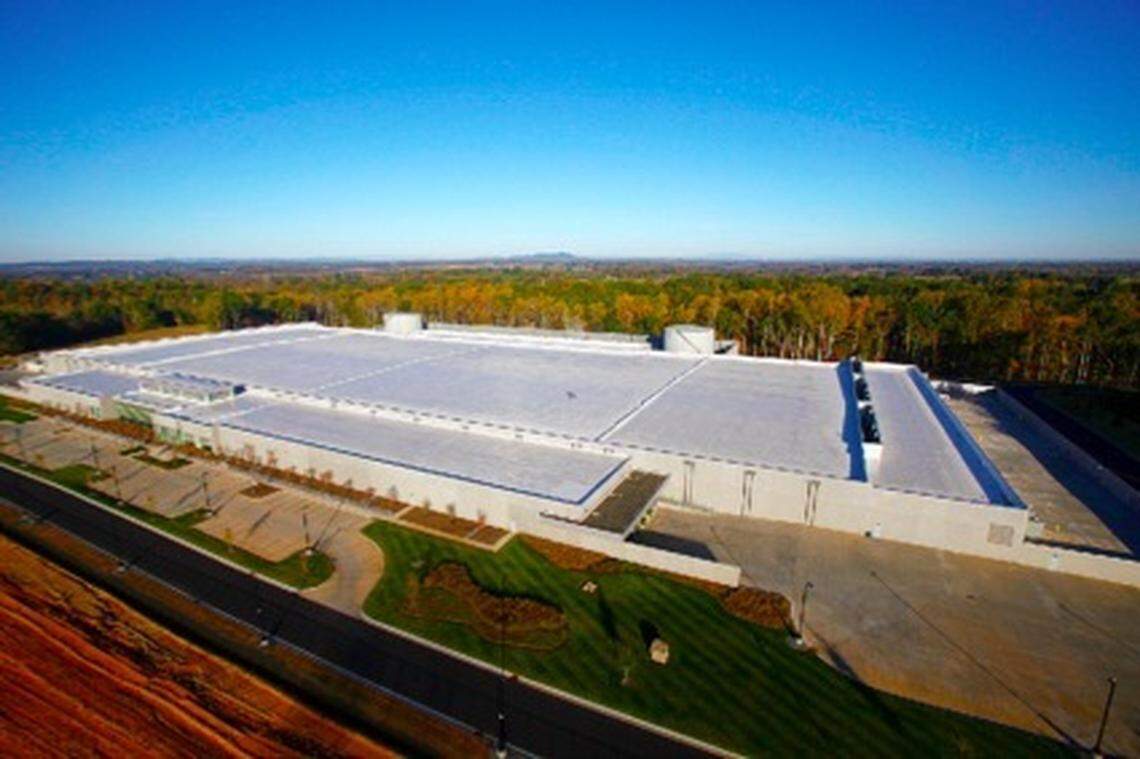 Apple plans to spend and invest more than $500 billion in the U.S. over the next four years, including expanding its data center capacity in North Carolina. Shown, the Apple data center in Maiden.