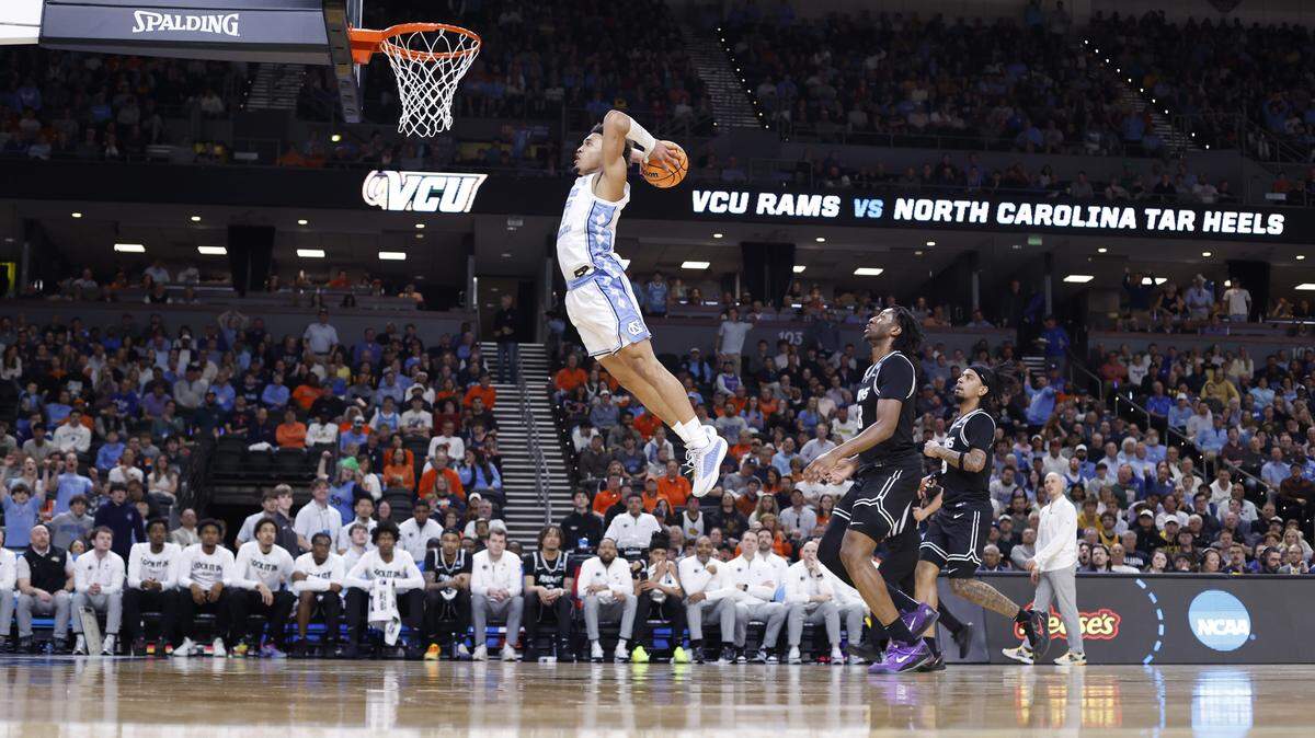 North Carolina's Seth Trimble (7) heads to slam in two during VCU’s 82-78 overtime victory over UNC in the first round of the NCAA Men’s Basketball Tournament at  Bon Secours Wellness Arena in Greenville, S.C., Thursday, March 19, 2026.