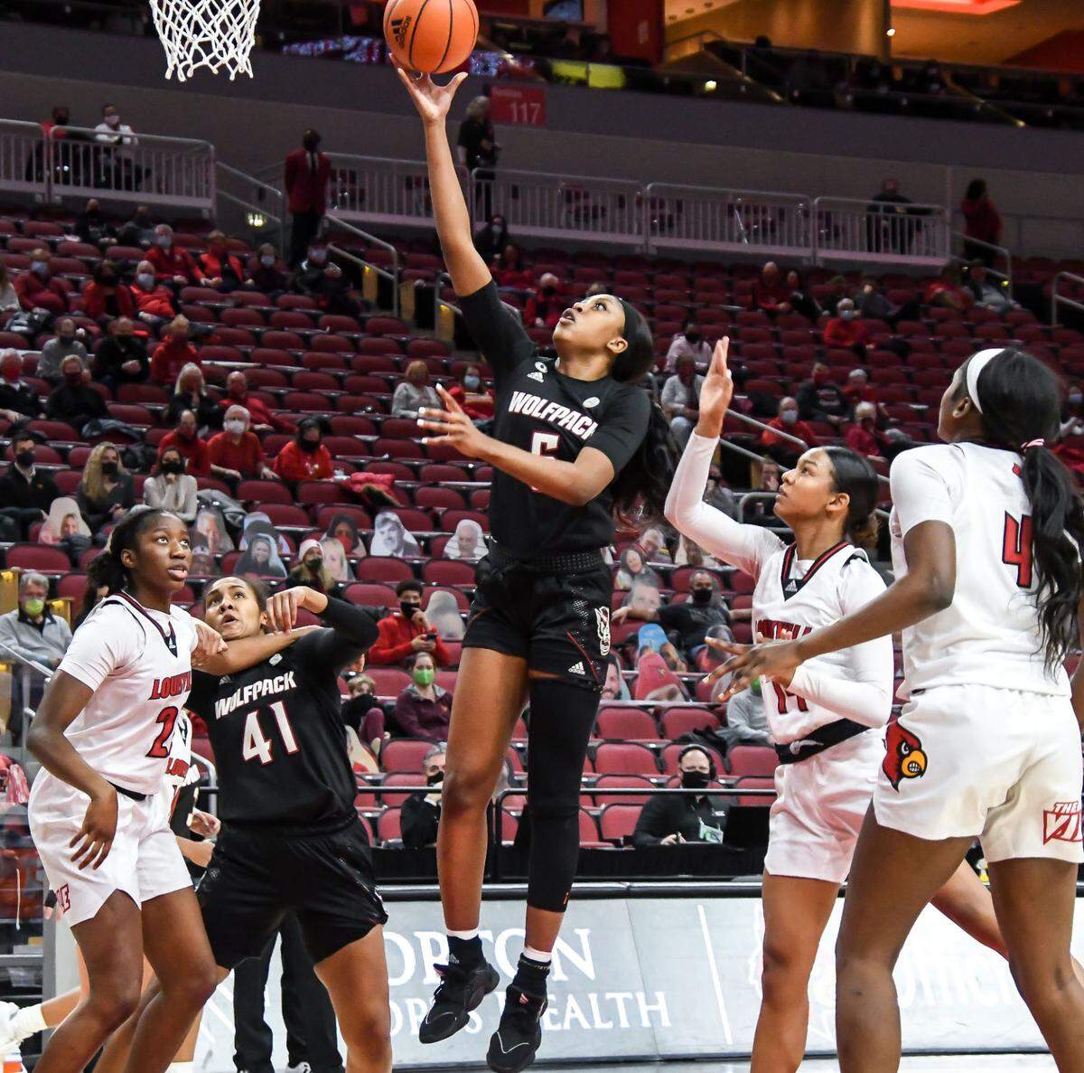 N.C. State’s Jada Boyd (5) heads to the basket during the Wolfpack’s game against Louisville at KFC Yum! Center in Louisville, Ky. Monday, February 1, 2021.