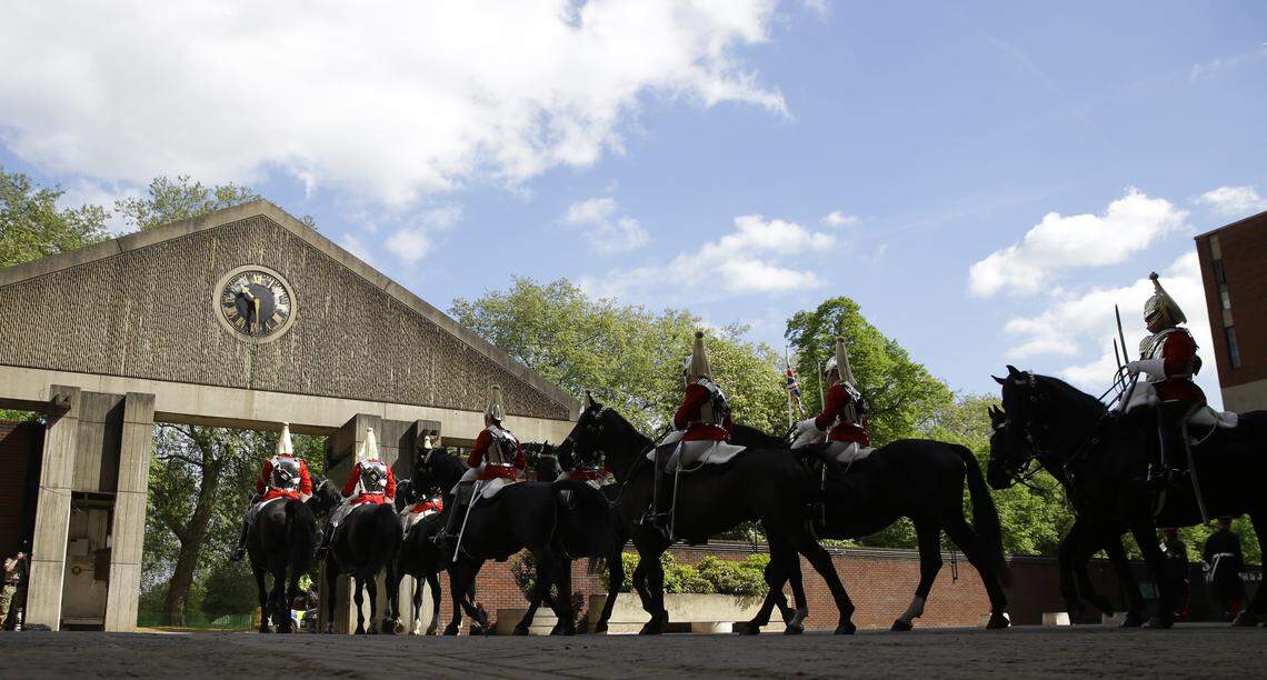 A Household Cavalry troop of Life Guards leaves the barracks for guard duty during a press day at the unit's barracks in London, Wednesday, May 9, 2018. The Household Cavalry was the unit that Prince Harry served in for two years, and it will also provide the ceremonial guard at his wedding to Meghan Markle in Windsor on May 19.