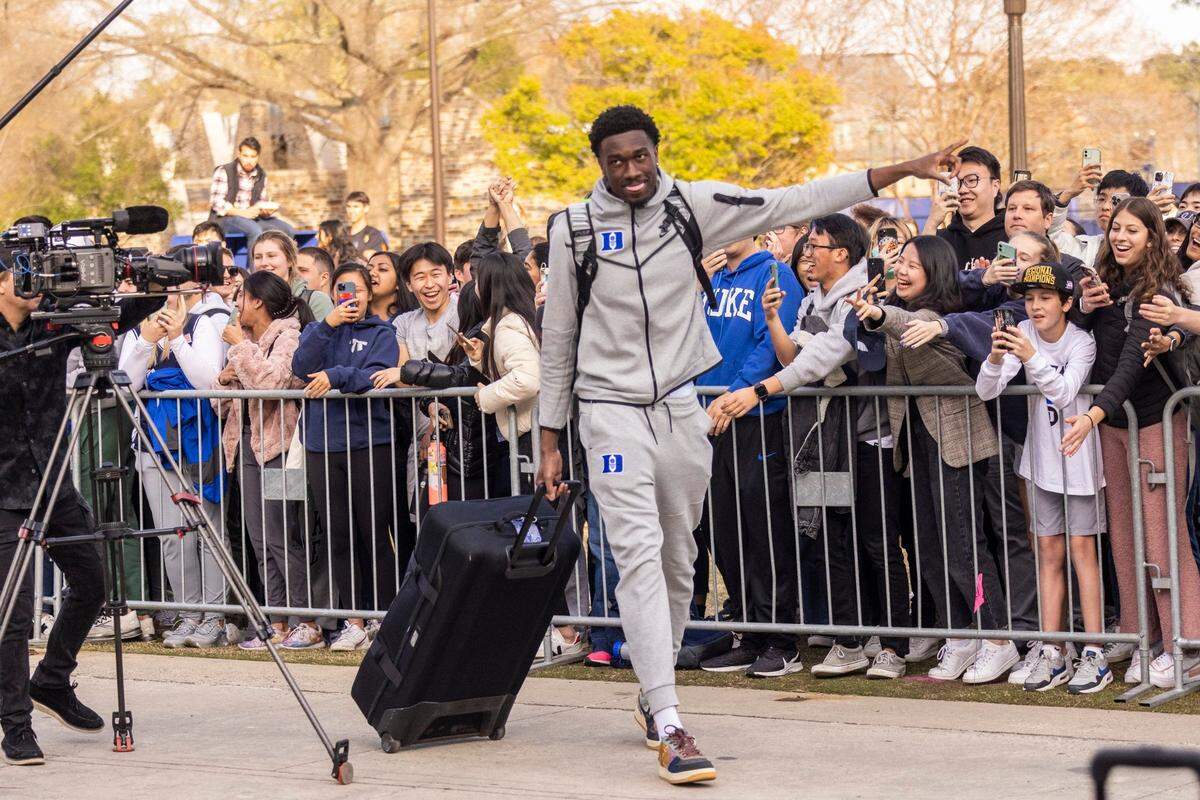 Duke’s Mark Williams prepares to depart for the Final Four in New Orleans Tuesday, March 29, 2022 outside Cameron Indoor Stadium.