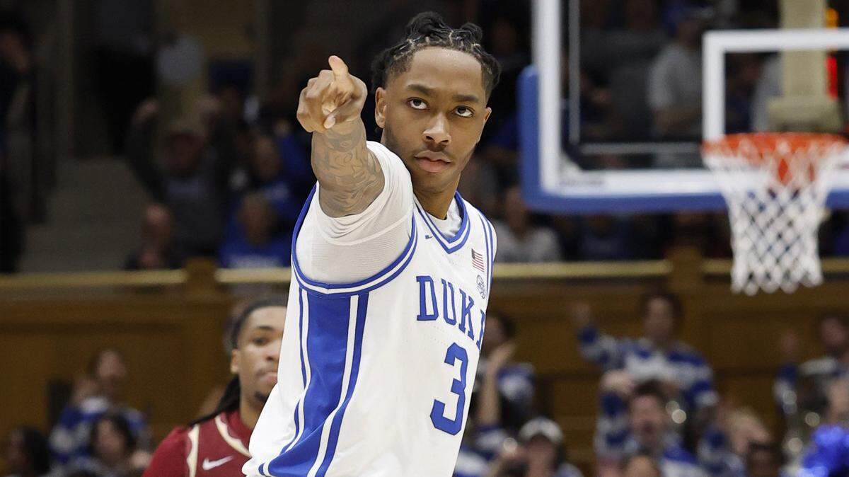 Duke’s Isaiah Evans (3) points back to Cooper Flagg after Evans hit a three-pointer on a pass from Flagg during the second half of Duke’s 100-65 victory over Florida State at Cameron Indoor Stadium in Durham, N.C., Saturday, March 1, 2025.