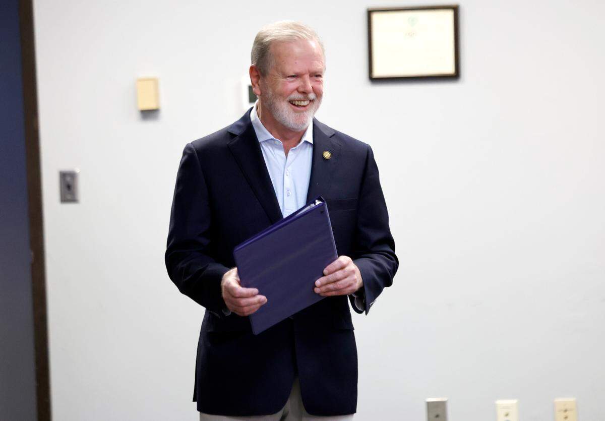 N.C. Senate leader Phil Berger smiles as he walks into a press conference at the N.C. Republican Party headquarters in Raleigh, N.C., Wednesday, Nov. 6, 2024.