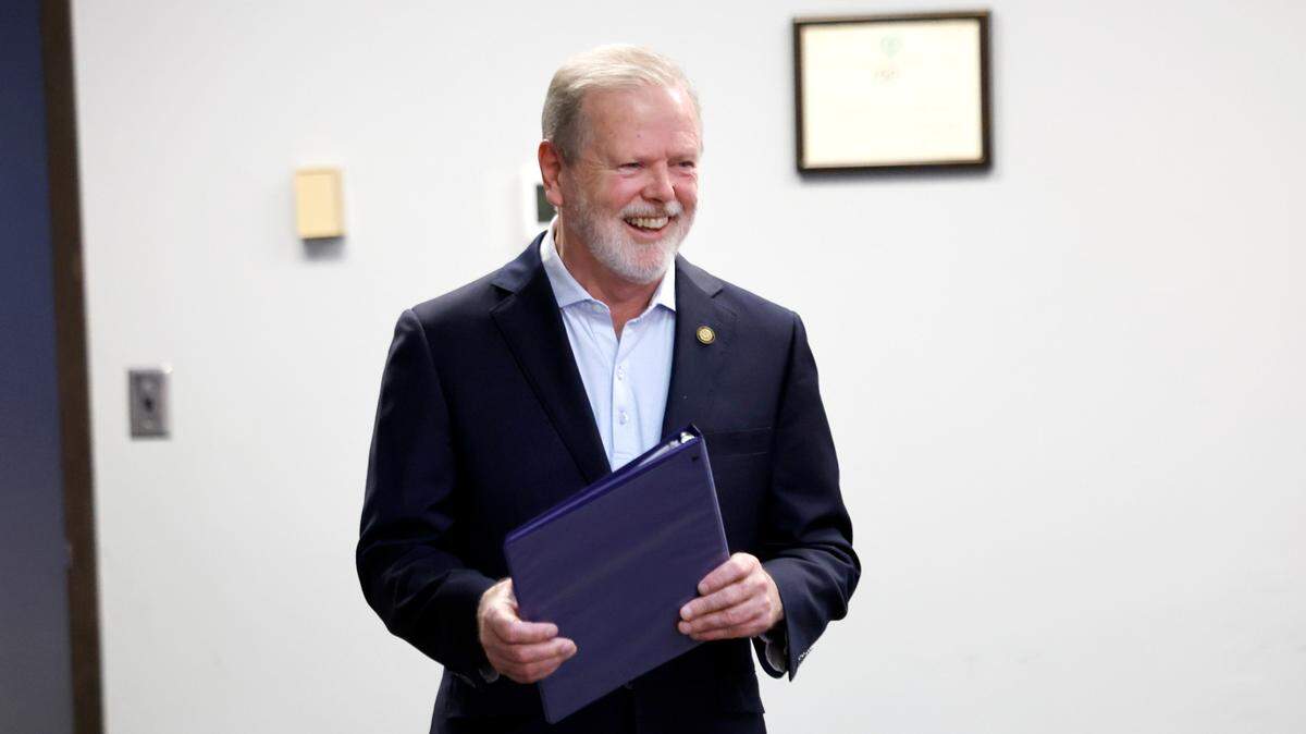 N.C. Senate leader Phil Berger smiles as he walks into a press conference at the N.C. Republican Party headquarters in Raleigh, N.C., Wednesday, Nov. 6, 2024.