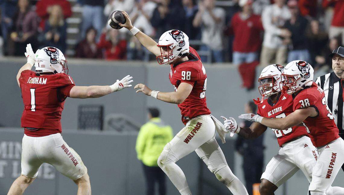 N.C. State punter Caden Noonkester (98) celebrates after recovering a punt that hit a Florida State player during the second half of N.C. State’s 21-11 victory over Florida State at Carter-Finley Stadium in Raleigh, N.C., Friday, Nov. 21, 2025.