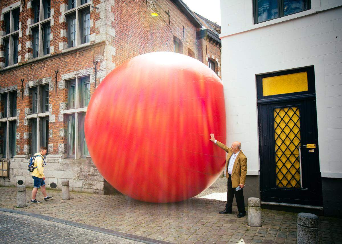 The RedBall Project from Asheville-based artist Kurt Perschke is photographed in Mons, Belgium, in 2015. It will be in Chapel Hill and the UNC campus from Sept. 20-26, 2018 as part of the Ackland Art Museum’s gift commemorating its 60th anniversary.