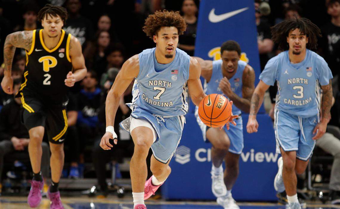 North Carolina Tar Heels guard Seth Trimble (7) brings the ball up court on a fast break against the Pittsburgh Panthers during the second half at the Petersen Events Center.