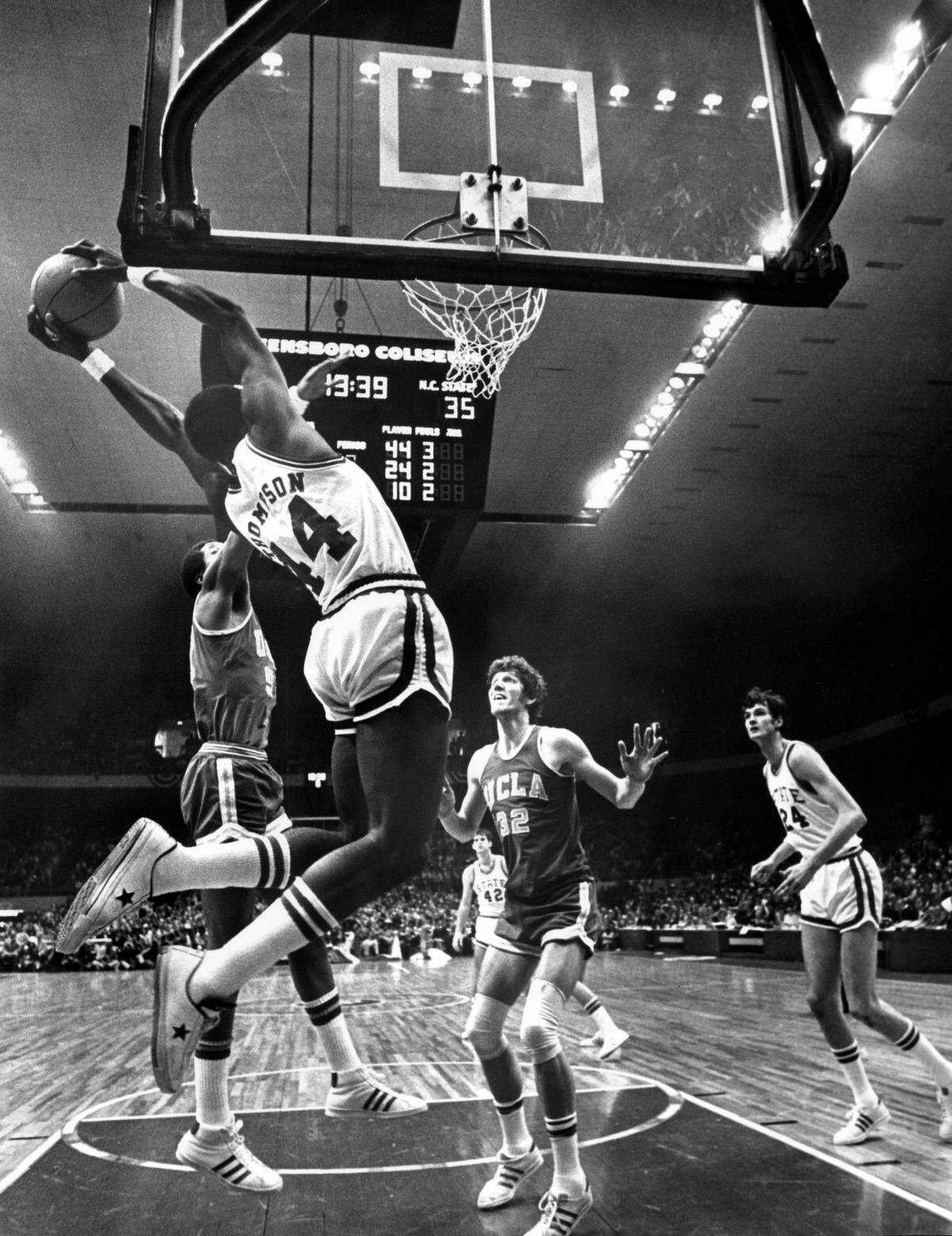 NC State’s David Thompson in action against UCLA and Bill Walton in 1974.