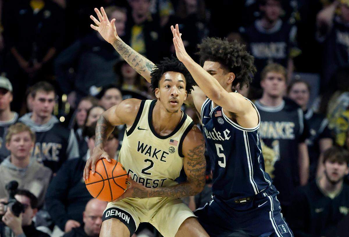 Duke’s Tyrese Proctor (5) defends Wake Forest’s Juke Harris (2) during the first half of Duke’s game against Wake Forest at LJVM Coliseum in Winston-Salem, N.C., Saturday, Jan. 25, 2025.