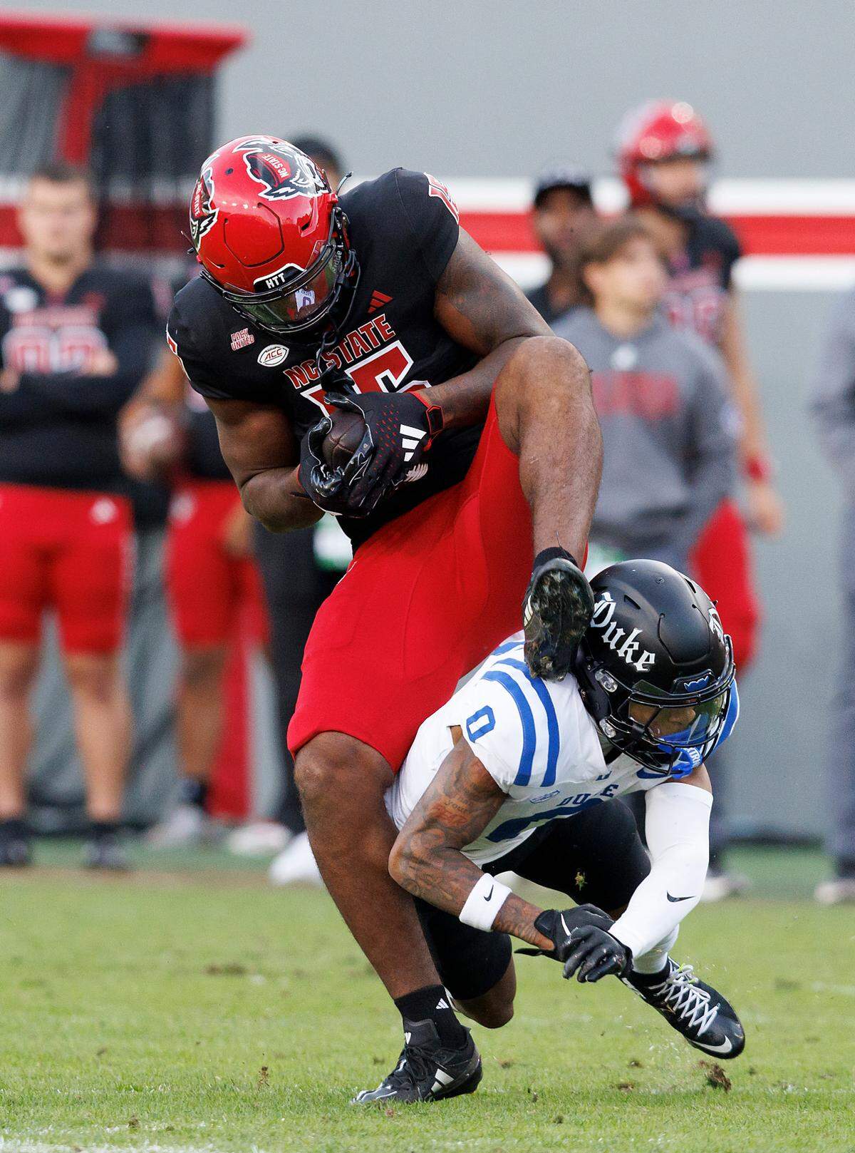 Duke’s Chandler Rivers tackles N.C. State’s Justin Joly during the first half of the Blue Devils’ 29-19 win on Saturday, Nov. 9, 2024, at Carter-Finley Stadium in Raleigh, N.C.