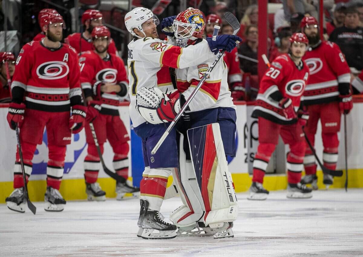 The Florida Panthers Nick Cousins (21) embraces goalie Sergei Bobrovsky (72) after a goal by Ryan Lomberg (94) in overtime against the Carolina Hurricanes. The goal was reviewed and overturned for goalie interference during Game 1 of the Eastern Conference Finals on Friday, May 19, 2023 at PNC Arena in Raleigh, N.C.