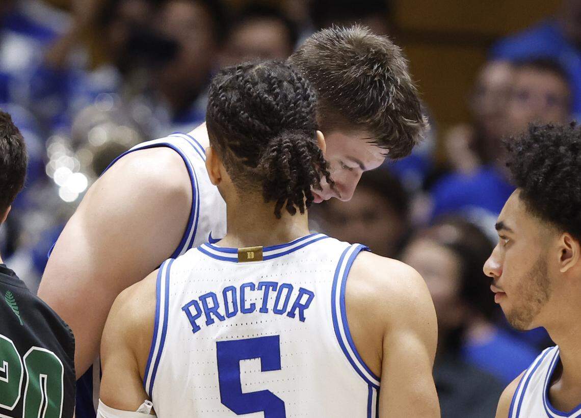 Duke’s Tyrese Proctor (5) talks with Kyle Filipowski (30) during the second half of Duke’s 92-54 victory over Dartmouth at Cameron Indoor Stadium in Durham, N.C., Monday, Nov. 6, 2023.