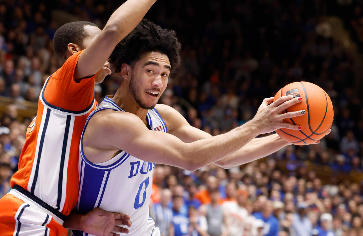 Duke’s Jared McCain (0) drives by Syracuse’s Quadir Copeland (24) during the second half of Duke’s 86-66 victory over Syracuse at Cameron Indoor Stadium in Durham, N.C., Tuesday, Jan. 2, 2024.