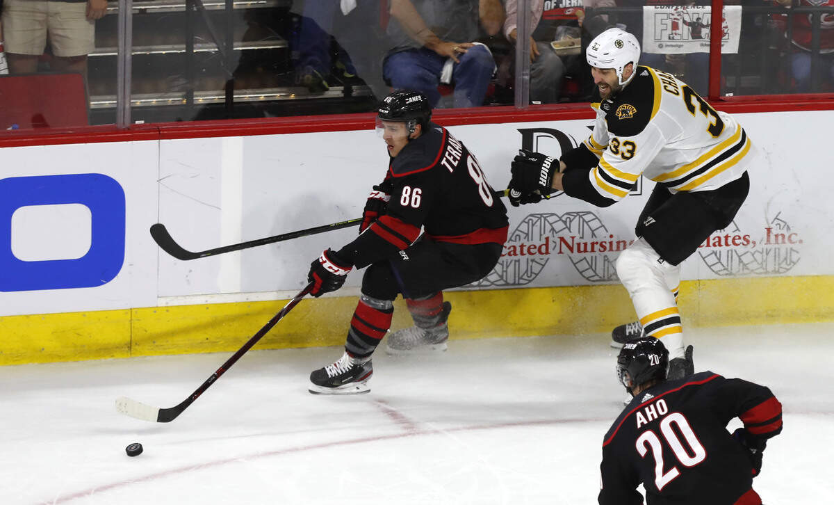 Carolina’s Teuvo Teravainen (86) takes the puck past Boston’s Zdeno Chara (33) during the first period of the Carolina Hurricanes’ game against the Boston Bruins in game three of the Eastern Conference finals at PNC Arena in Raleigh, N.C. Tuesday, May 14, 2019.