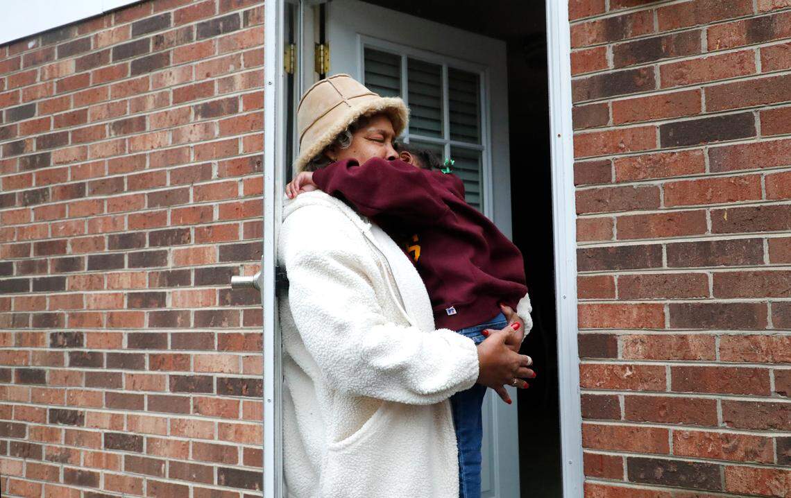 Ruby Gordon hugs her granddaughter Gracelyn Gordon, 4, at Gordon’s home in Winston-Salem, N.C., Thursday, Feb. 3, 2022. Gordon lives within the evacuation zone for the Winston Weaver Company fertilizer plant fire.