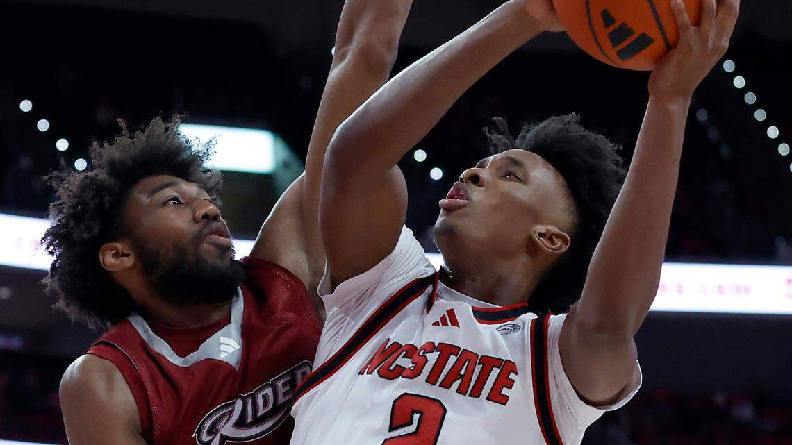 N.C. State’s Paul McNeil goes up for a shot against Rider’s T.J. Weeks Jr. during the second half of the Wolfpack’s 89-63 win on Sunday, Dec. 22, 2024, at Lenovo Center in Raleigh, N.C.