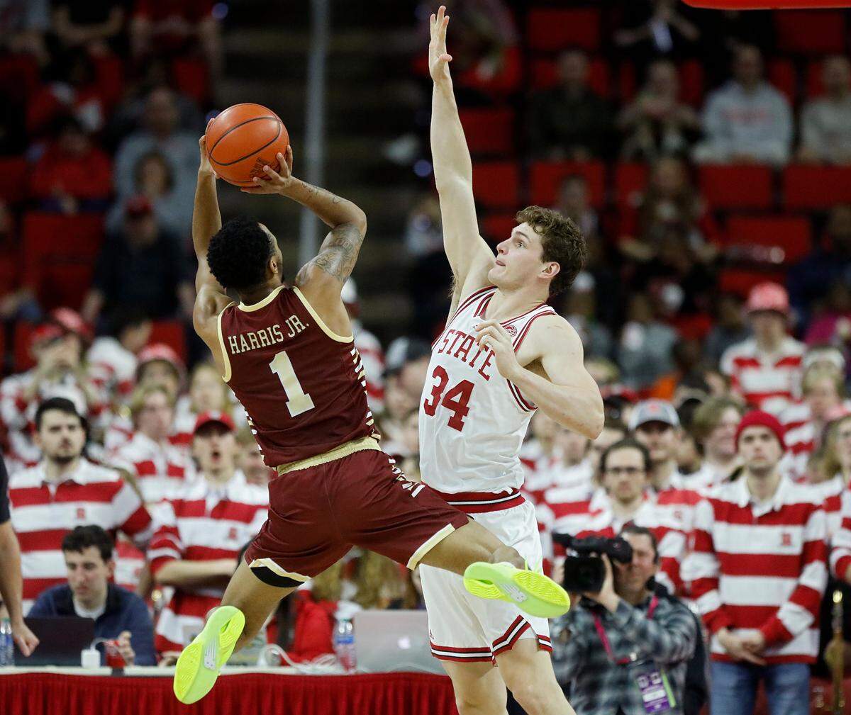 N.C. State’s Ben Middlebrooks defends a shot by Boston College’s Claudell Harris Jr. during the second half of the Wolfpack’s 81-70 win on Saturday, Feb. 24, 2024, at PNC Arena in Raleigh, N.C.