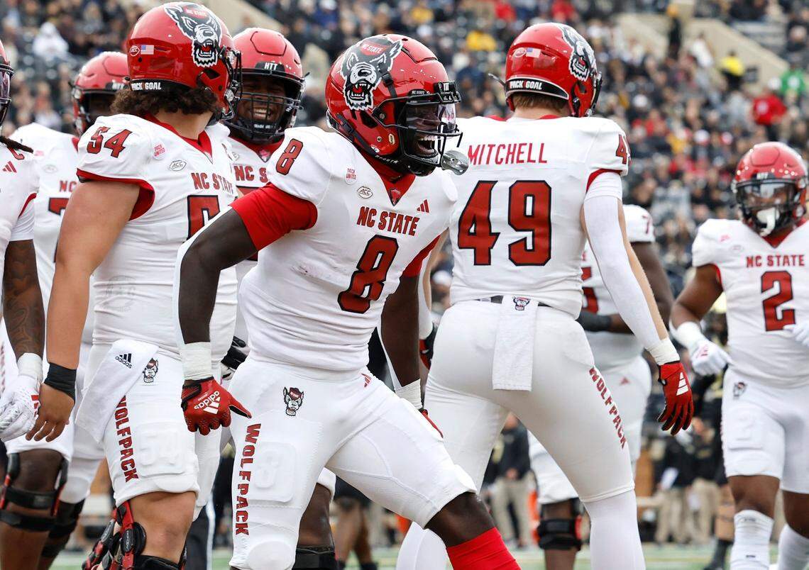 N.C. State wide receiver Julian Gray (8) celebrates after scoring on a 20-yard touchdown reception during the first half of N.C. State’s game against Wake Forest at Allegacy Stadium in Winston-Salem, N.C., Saturday, Nov. 11, 2023.