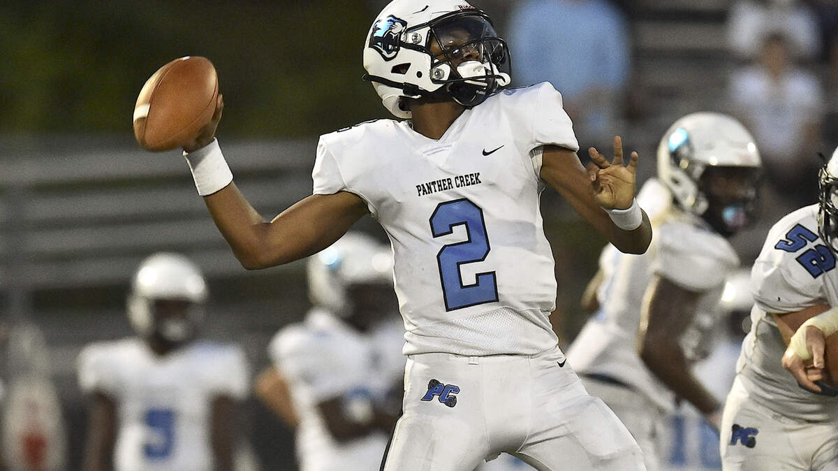 Panther Creek’s Amari Odom (2) prepares to launch the pass during the second quarter f a game against Leesville Road in August. On Friday, Sept. 24, Panther Creek, led by Odom, upended Green Level on the road.