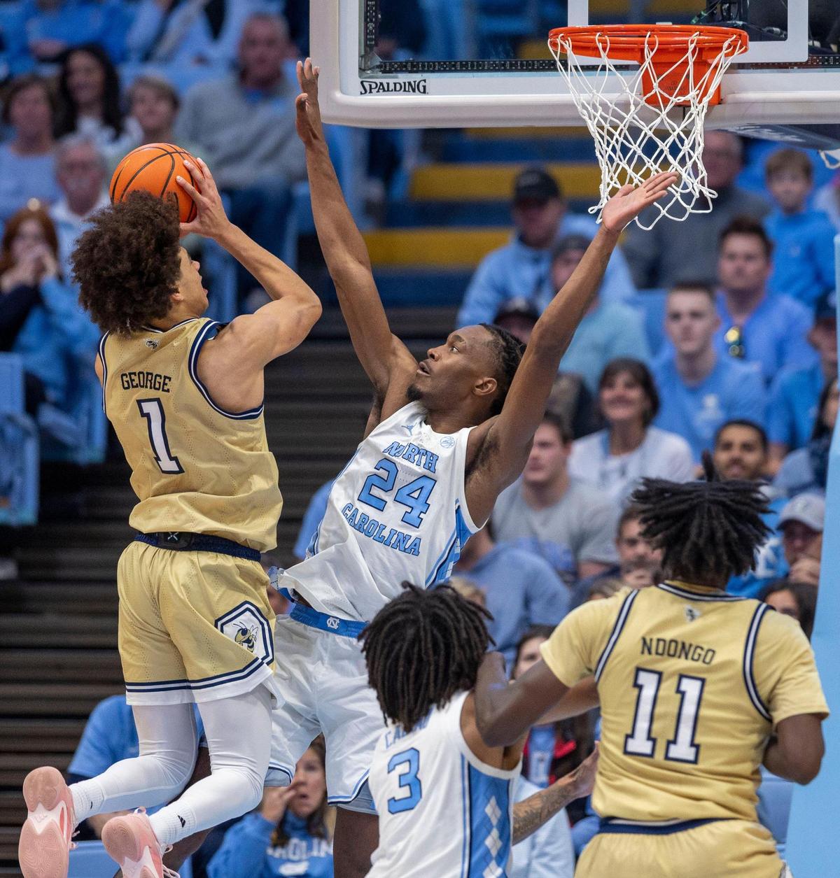 North Carolina North Carolina forward Jae’Lyn Withers (24) defends Georgia Tech’s Naithan George (1) in the second half on Saturday, December 7, 2024 at the Smith Center in Chapel Hill, N.C.