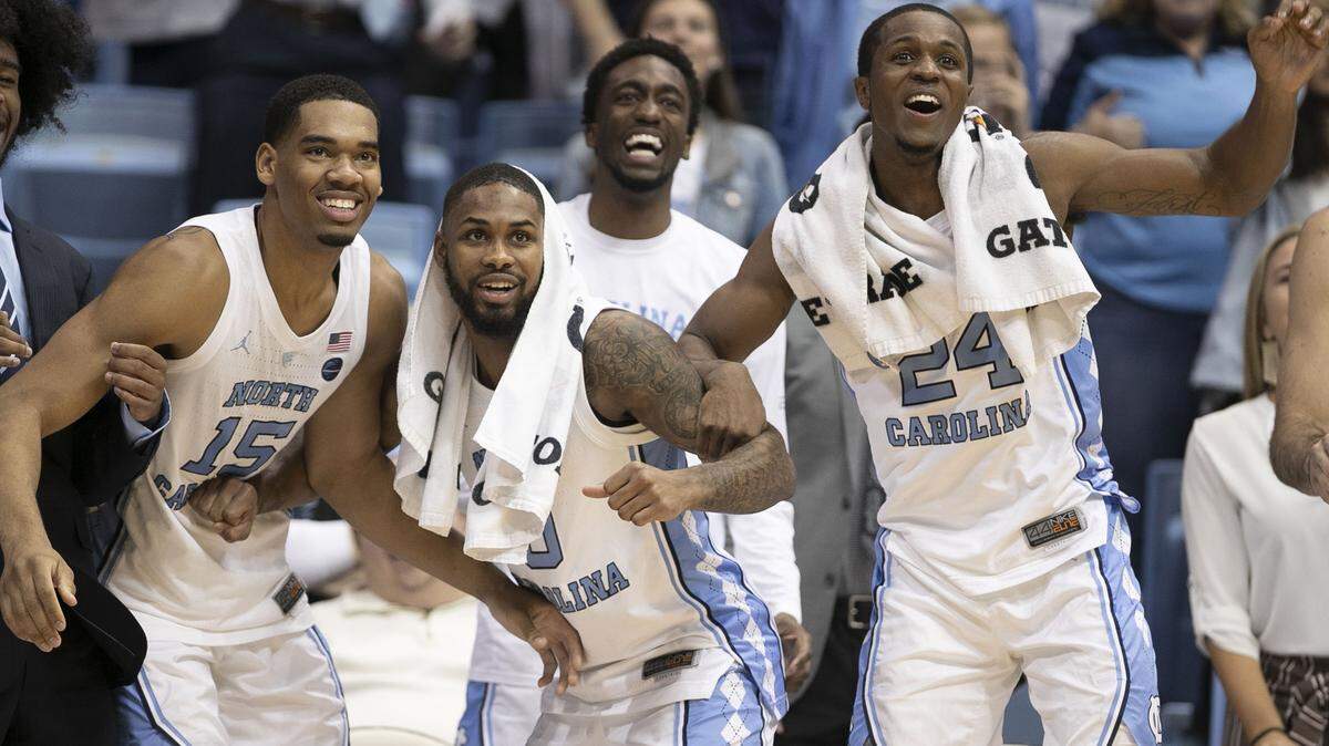 North Carolina’s Garrison Brooks (15), Seventh Woods (0), Brandon Robinson (4) and Kenny Williams (24) are all from out of state.