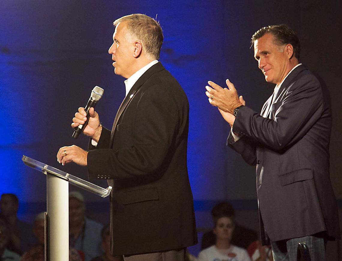 Mitt Romney campaigns for Republican Senate candidate and N.C. House Speaker Thom Tillis in October 2014 in Raleigh.