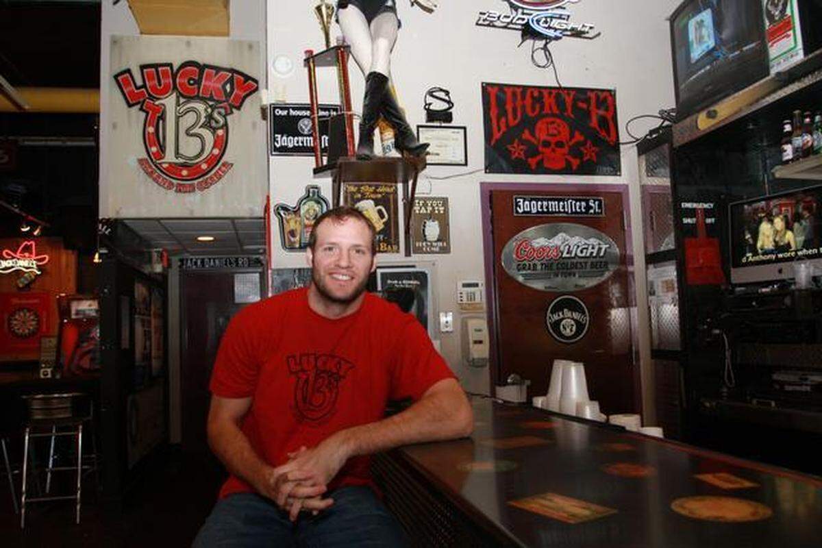Bates Battaglia, a former Carolina Hurricane, now owns Lucky B’s in Raleigh’s Glenwood South neighborhood. He gets help running his business from his father, a longtime business owner himself.