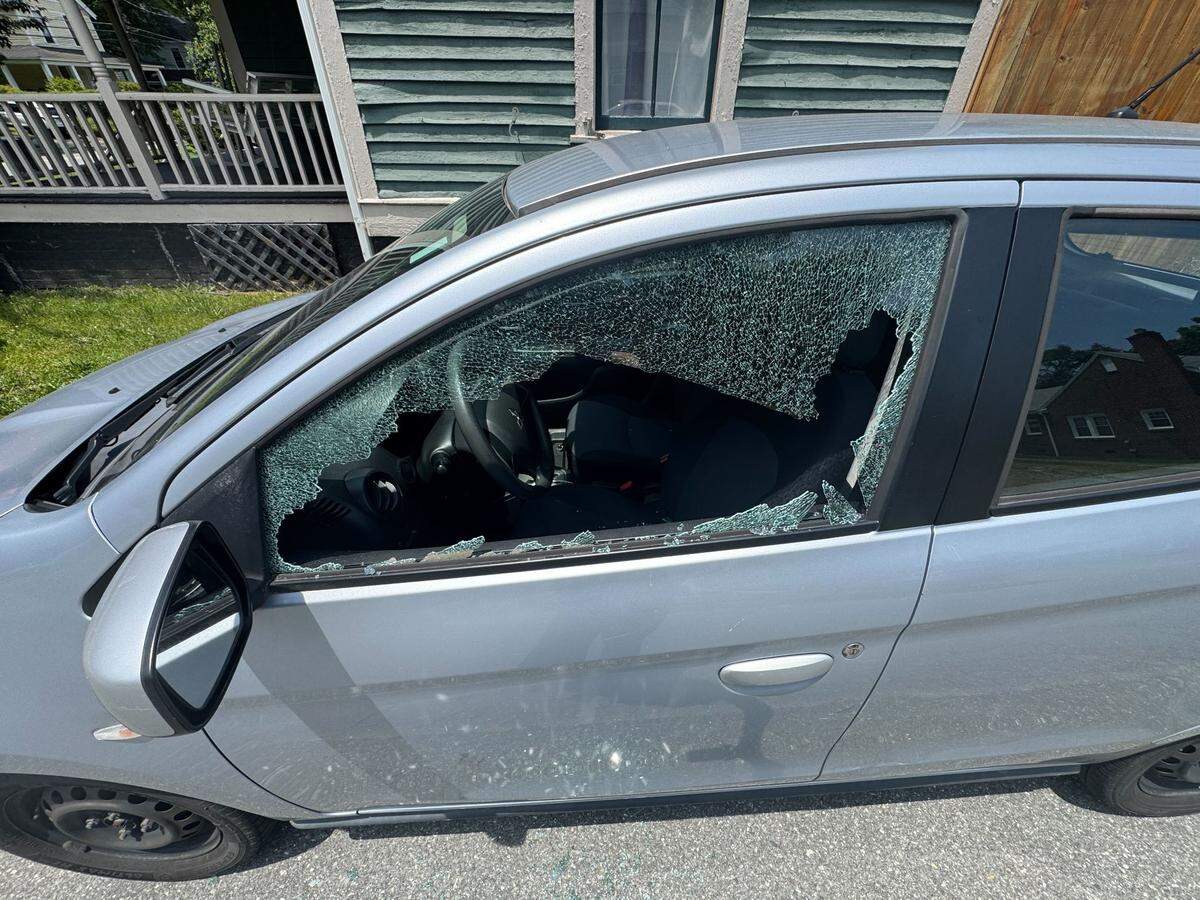 The shattered left window of Laura Brache’s car. Brache said the window shattered on Wednesday due to extreme heat.