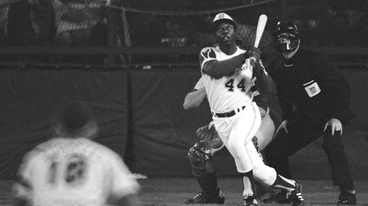 Hank Aaron eyes the flight of the ball after hitting his 715th career homer in a game against the Los Angeles Dodgers in Atlanta, Ga., in this April 8, 1974 file photo.  