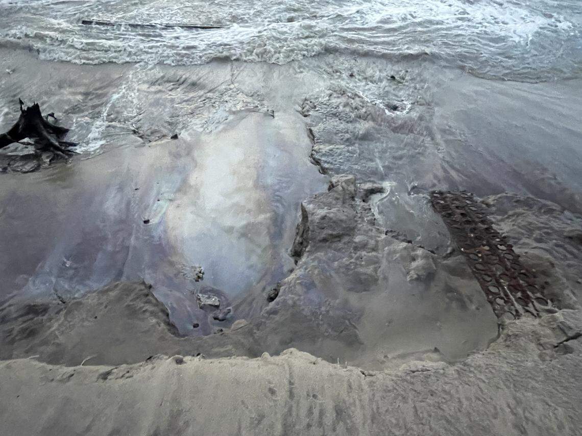 The petroleum in the water is believed to be fuel leaking from a military site that operated on the island, the National Park Service says.