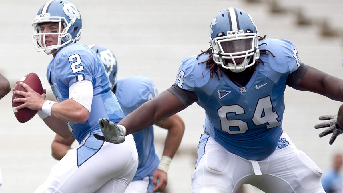 UNC quarterback Bryn Renner (2) drops into the pocket behind the protection of Jonathan Cooper (64) during the Tar Heels’ Spring football game on Saturday April 9, 2011, at Kenan Stadium in Chapel Hill, N.C.