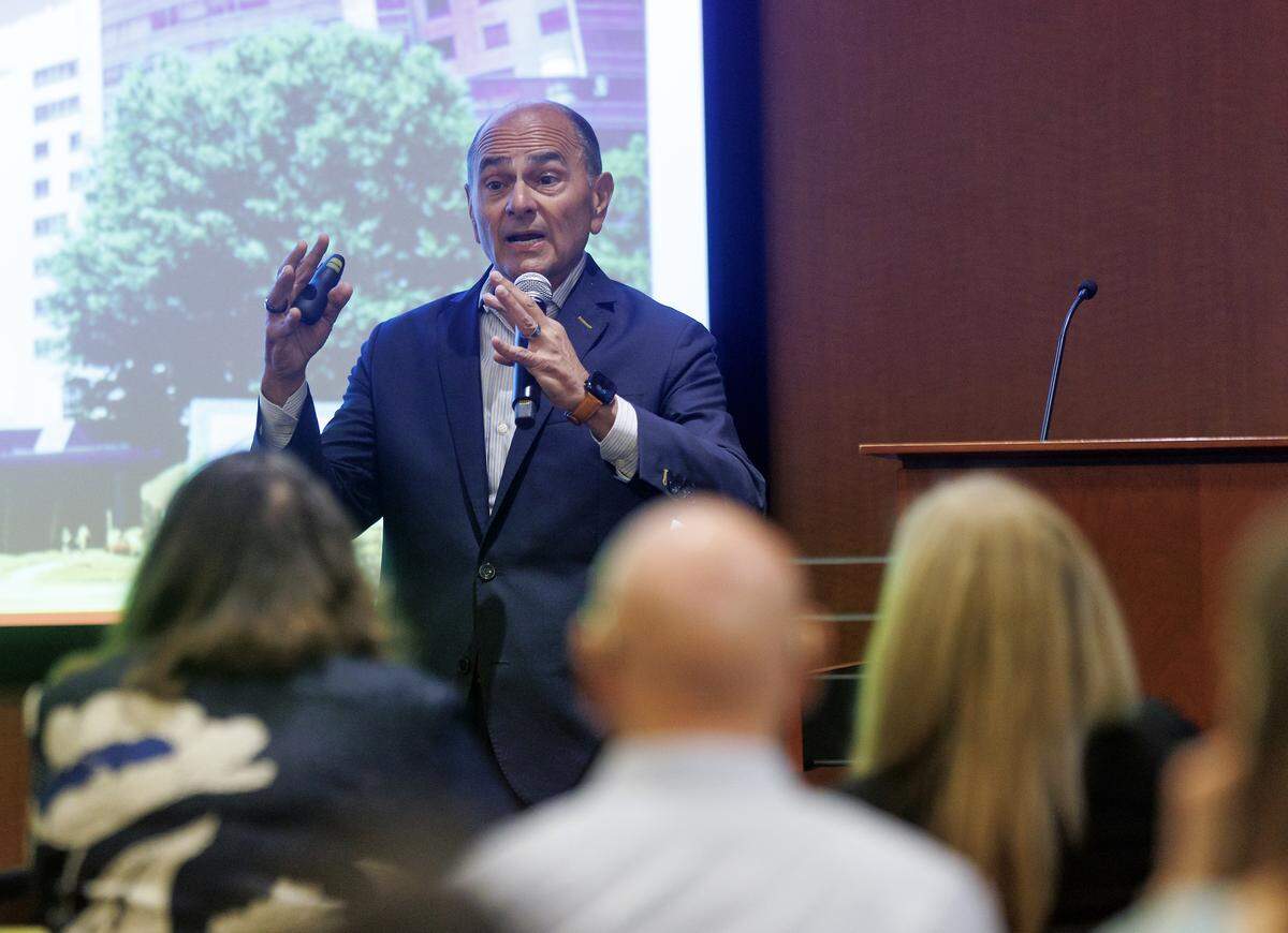 WakeMed CEO and President Donald Gintzig speaks during a community forum in Raleigh on Tuesday.