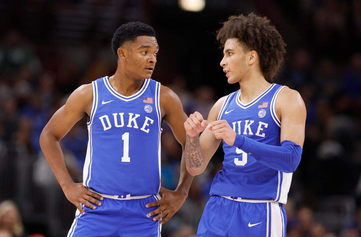 Duke’s Caleb Foster (1) talks with Tyrese Proctor (5) during the first half of Duke’s game against Michigan State in the Champions Classic at the United Center in Chicago, IL, Tuesday, Nov. 14, 2023.