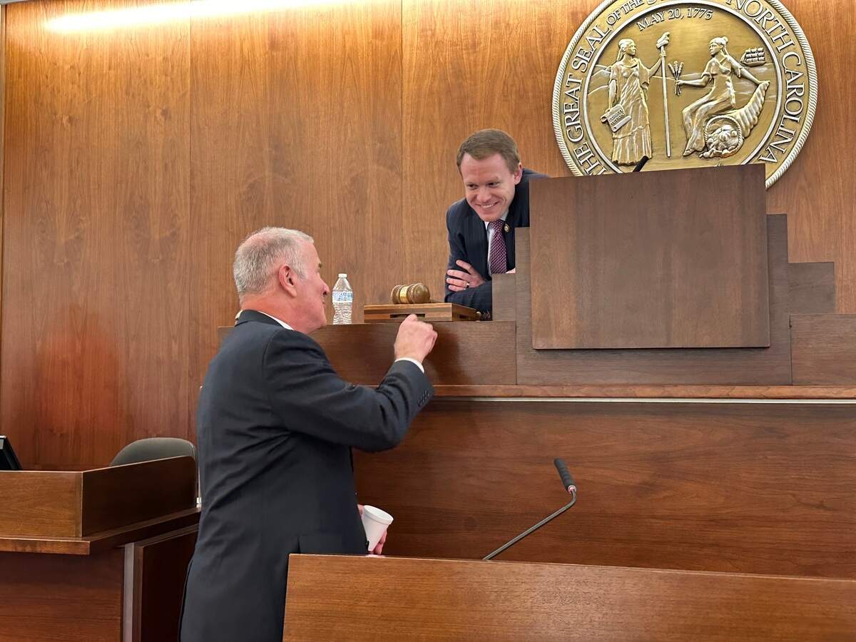 Rep. John Blust, a Greensboro Republican, speaks with House Speaker Destin Hall after a voting session on Tuesday, April 1, 2025.