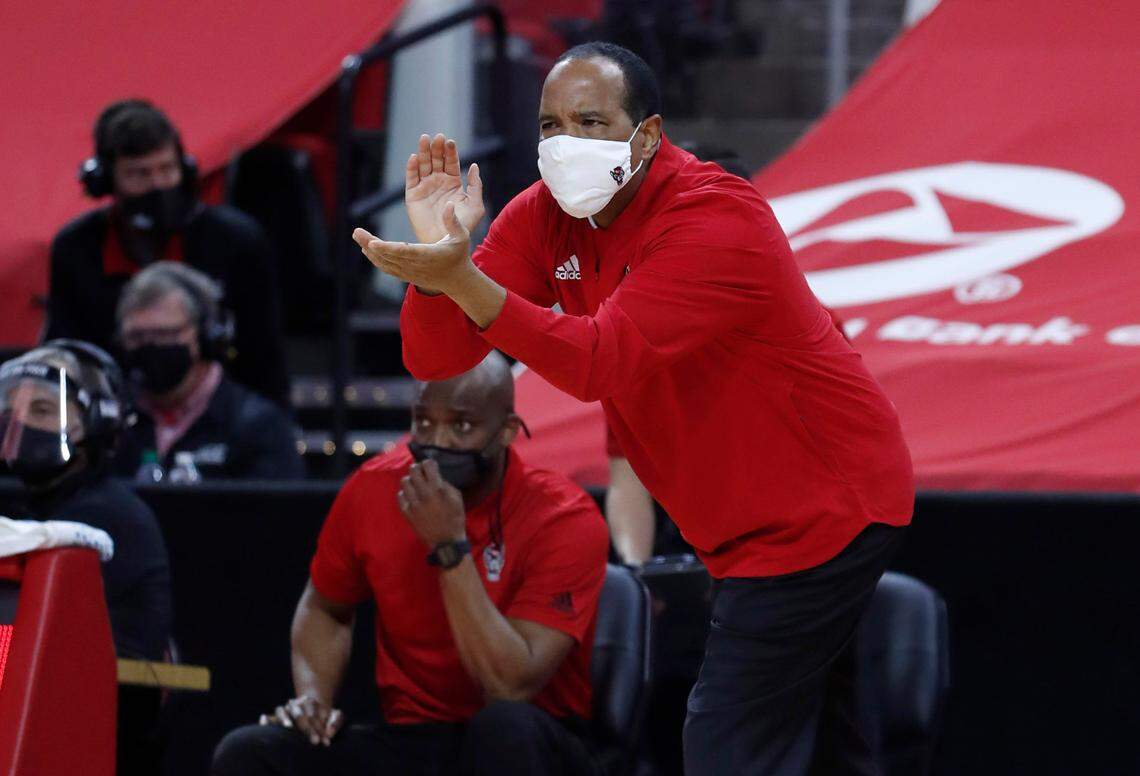 N.C. State head coach Kevin Keatts encourages his team during the first half of N.C. State’s game against Miami at PNC Arena in Raleigh, N.C., Saturday, January 9, 2021.