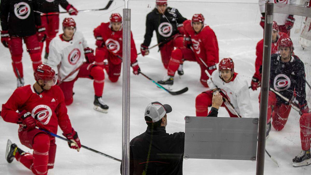 Carolina Hurricanes coach Rod Brind’Amour works with his team during practice on Friday morning, December 3, 2021 at PNC Arena in Raleigh, N.C.
