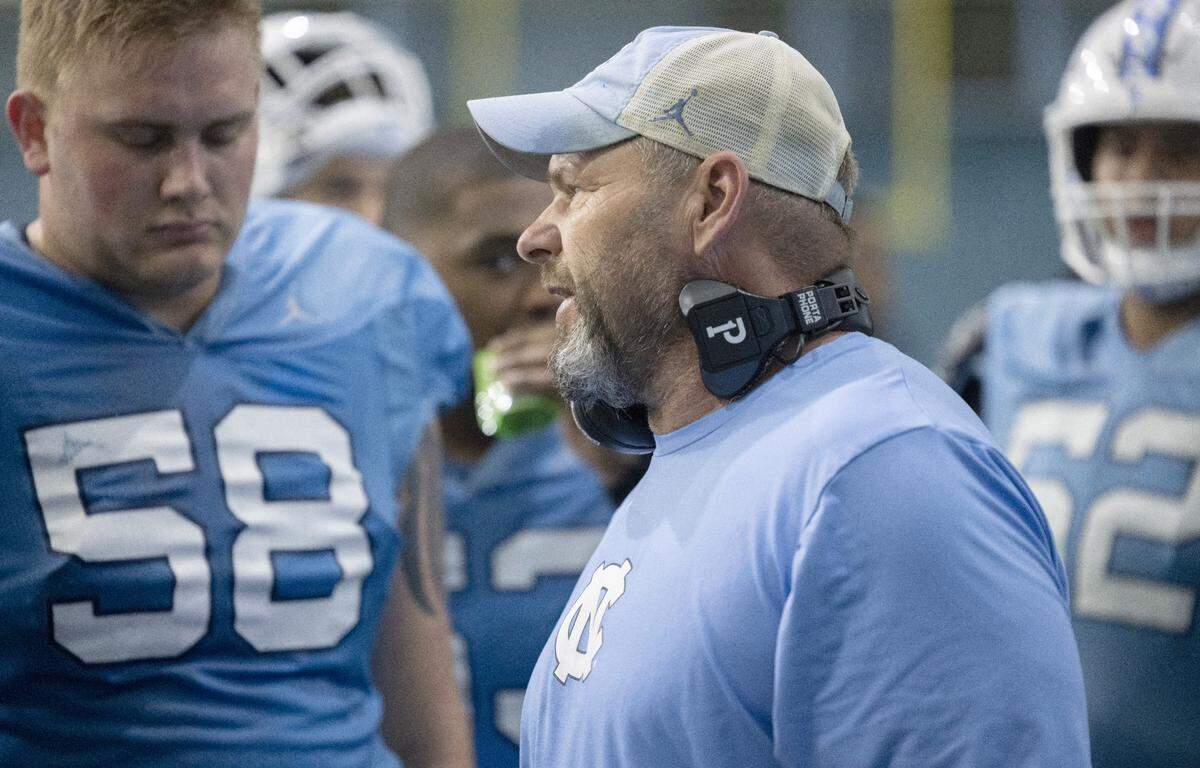 North Carolina offensive line coach Randy Clements talks with his unit during the Tar Heels’ scrimmage on Thursday, April 11, 2024 in Chapel Hill, N.C.