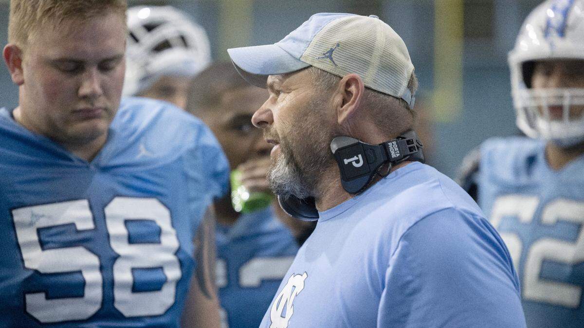North Carolina offensive line coach Randy Clements talks with his unit during the Tar Heels’ scrimmage on Thursday, April 11, 2024 in Chapel Hill, N.C.